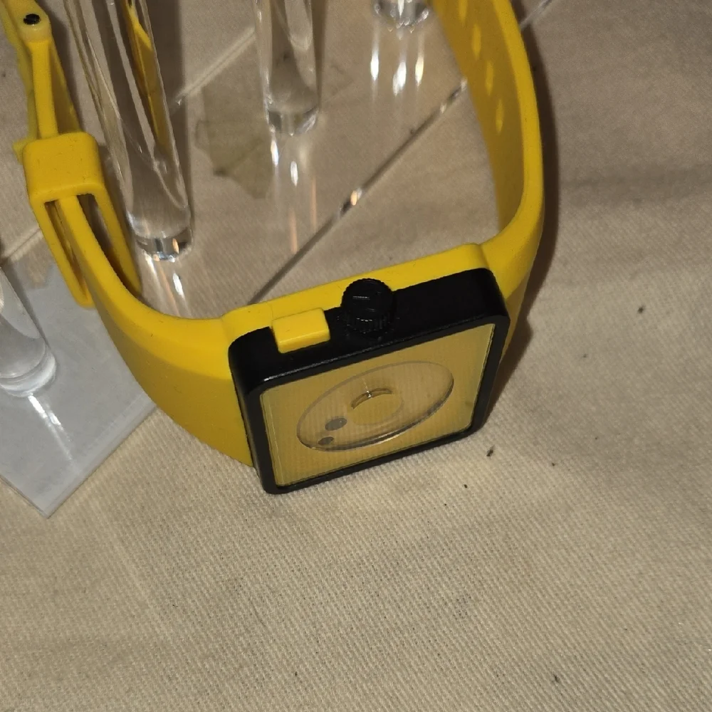Nixon yellow smartwatch